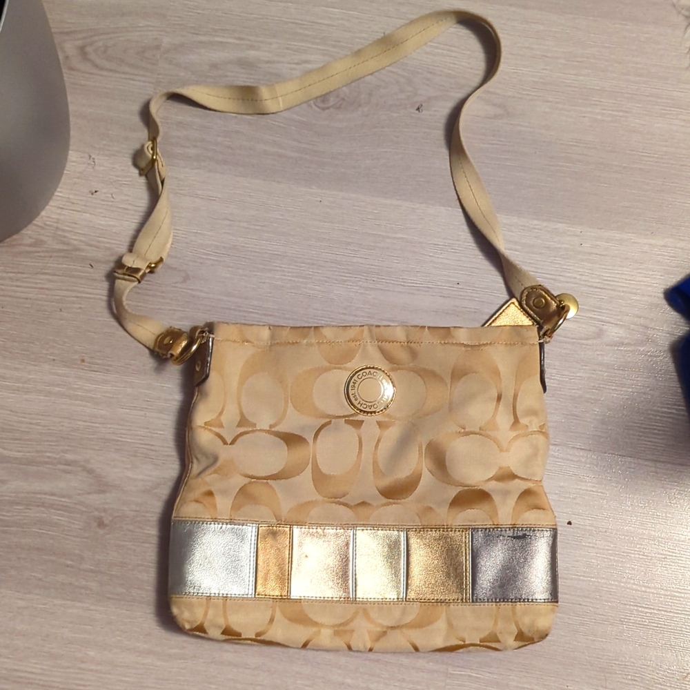 Gold Coach Purse.